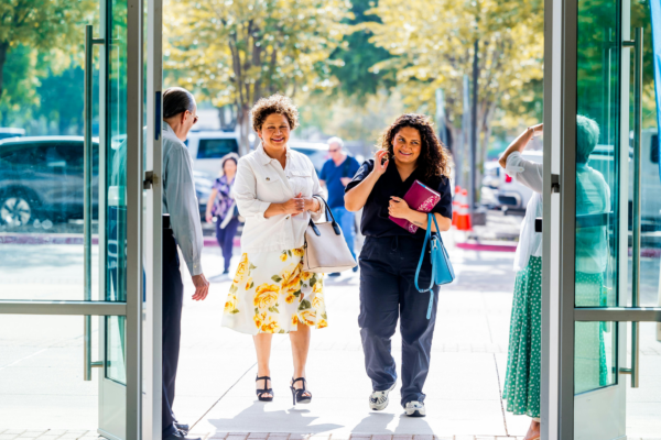 Family Walking into Building